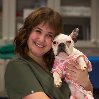 home_veterinary_team_8 Samantha holding white dog